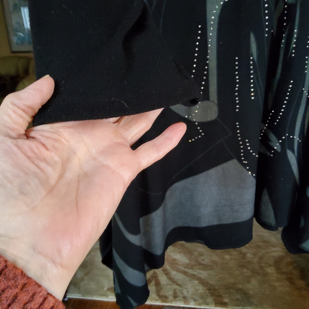 MINKAS Black Long Sleeve Tunic with Asymmetrical Hem and Relaxed Fit - Picture 4 of 9